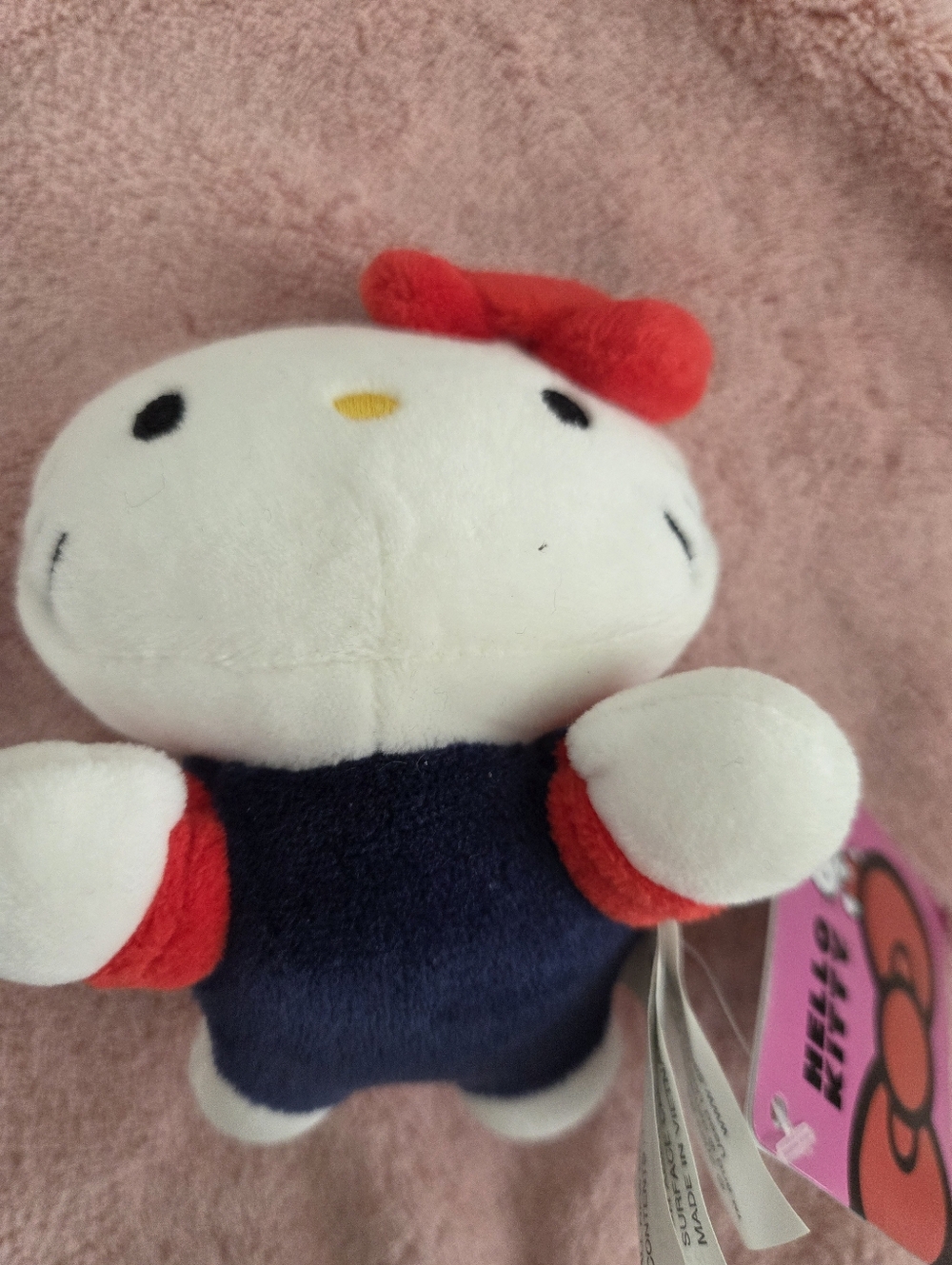 4" Hello Kitty in Blue Overall laying down Stuffed Plush
